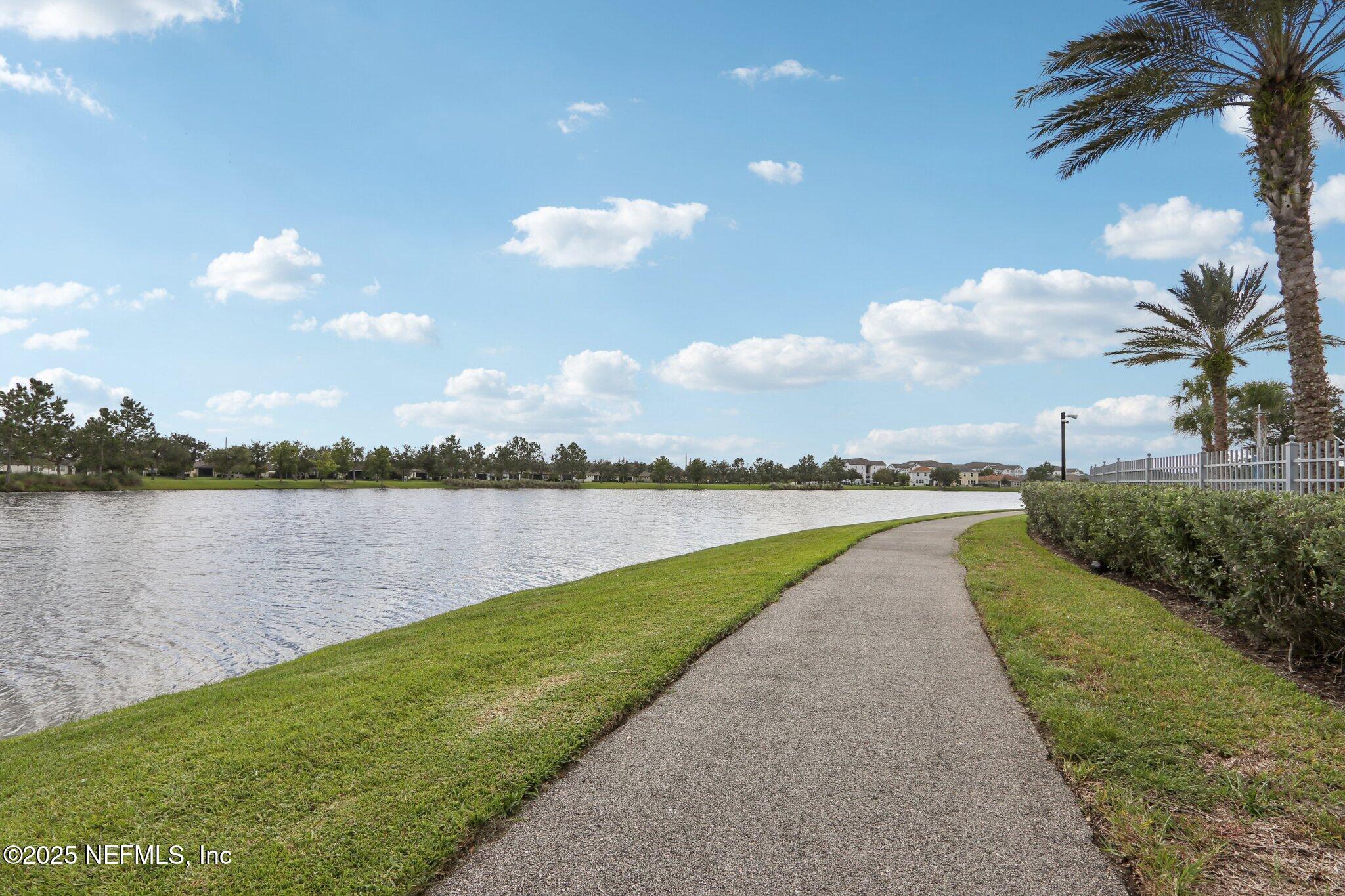 112 Bridge Oak Lane St. Augustine, FL 32095 - Photo 46 of 47 a view of a lake with a big yard