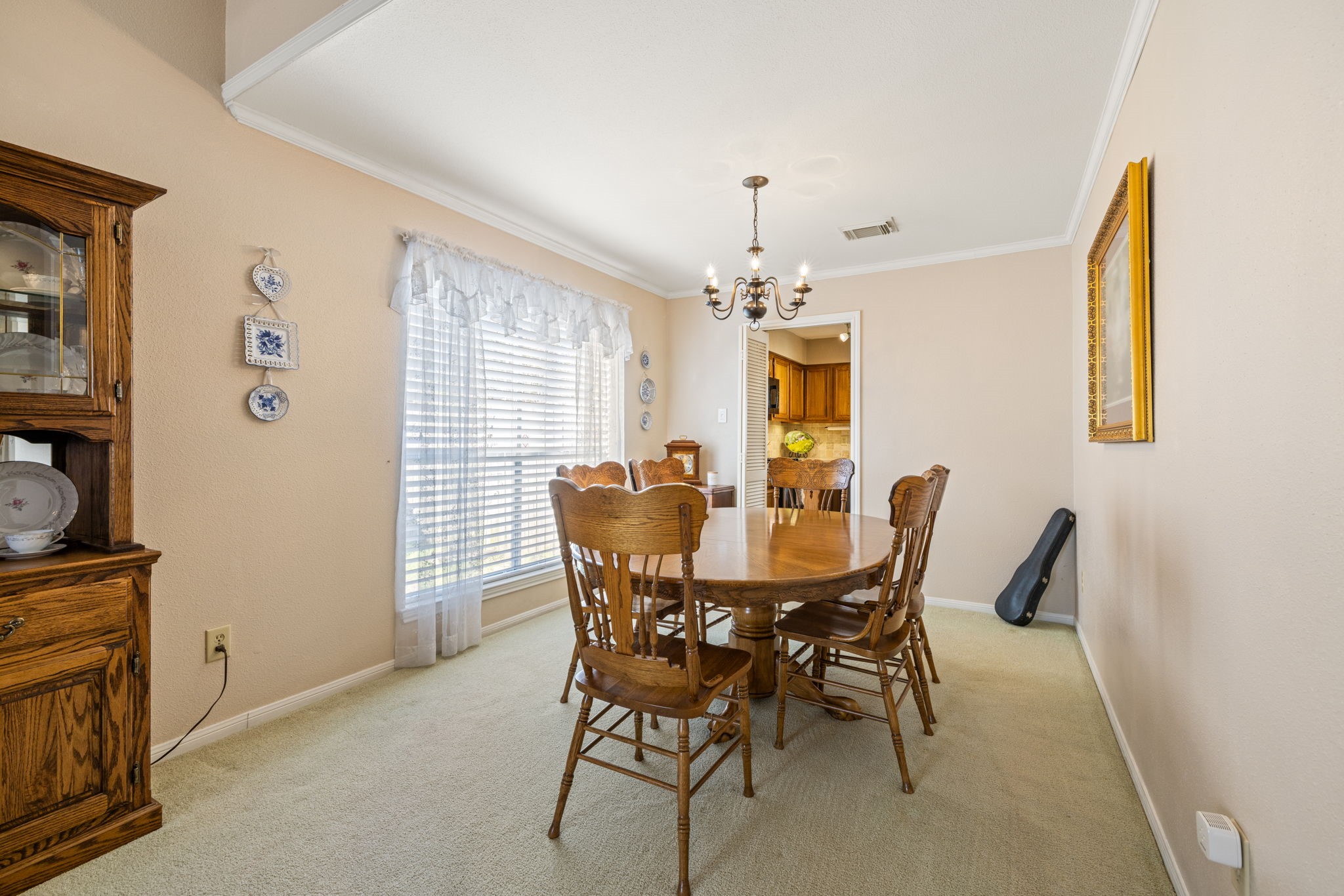 9102 Woodhouse Drive Spring, TX 77379 - Photo 7 of 32 DINING ROOM - It has easy access to the kitchen and has a nice large window to let in natural light.