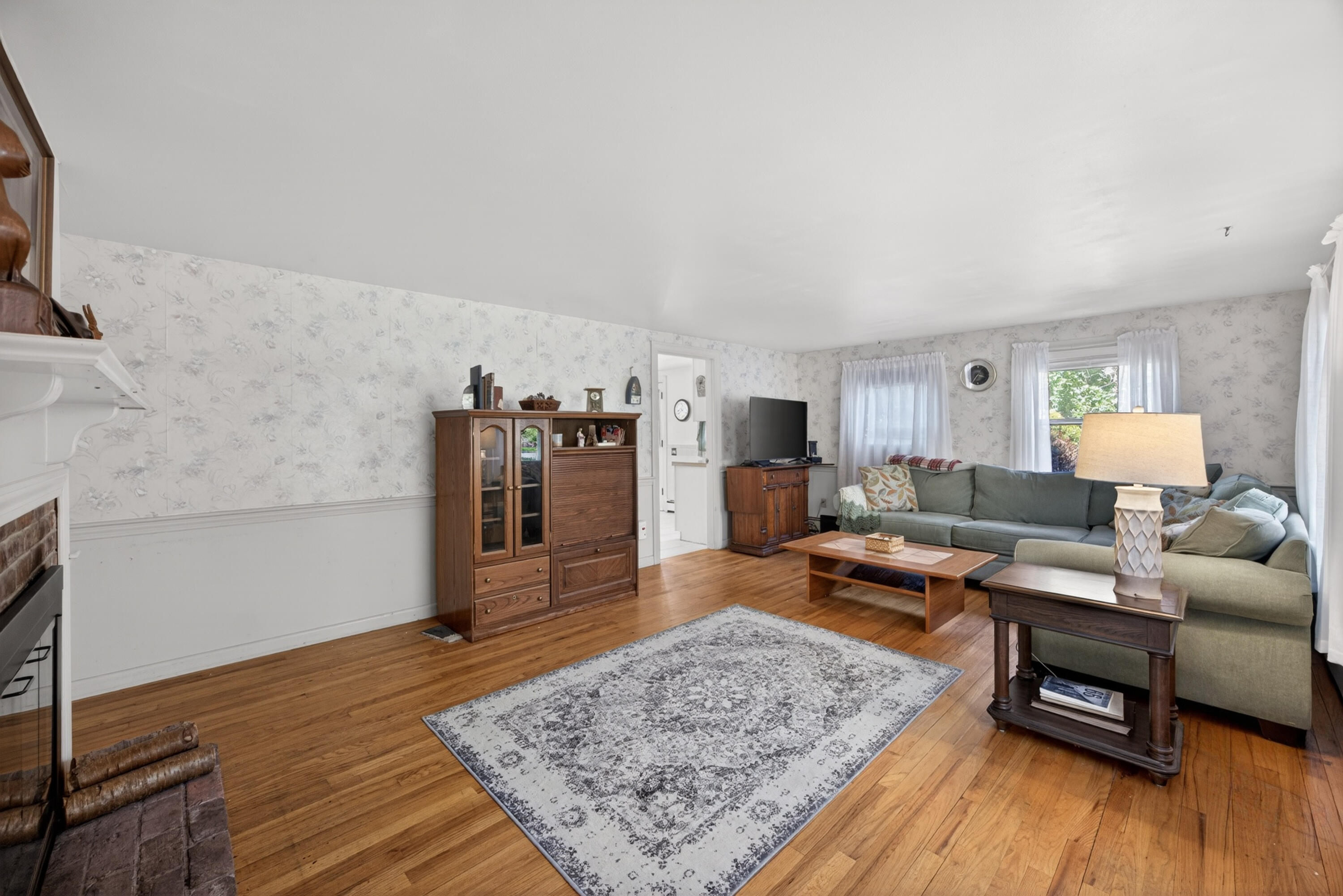 23 Nickerson Road Orleans, MA 02653 - Photo 7 of 54 a living room with furniture and wooden floor