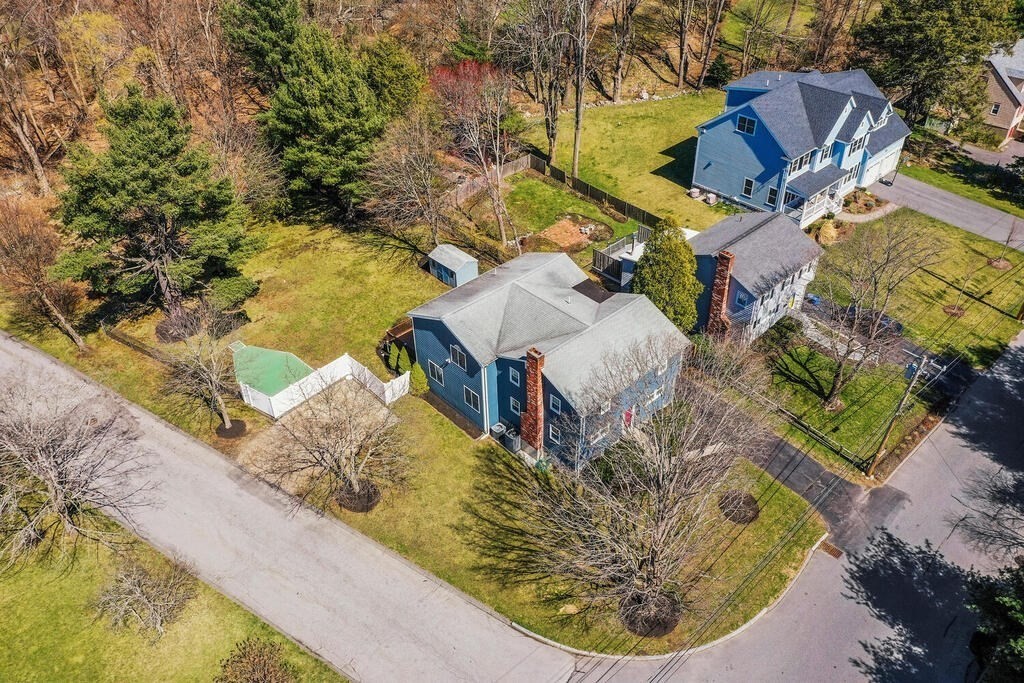80 Bridge Street Lexington, MA 02421 - Photo 3 of 37 a view of a swimming pool with a yard