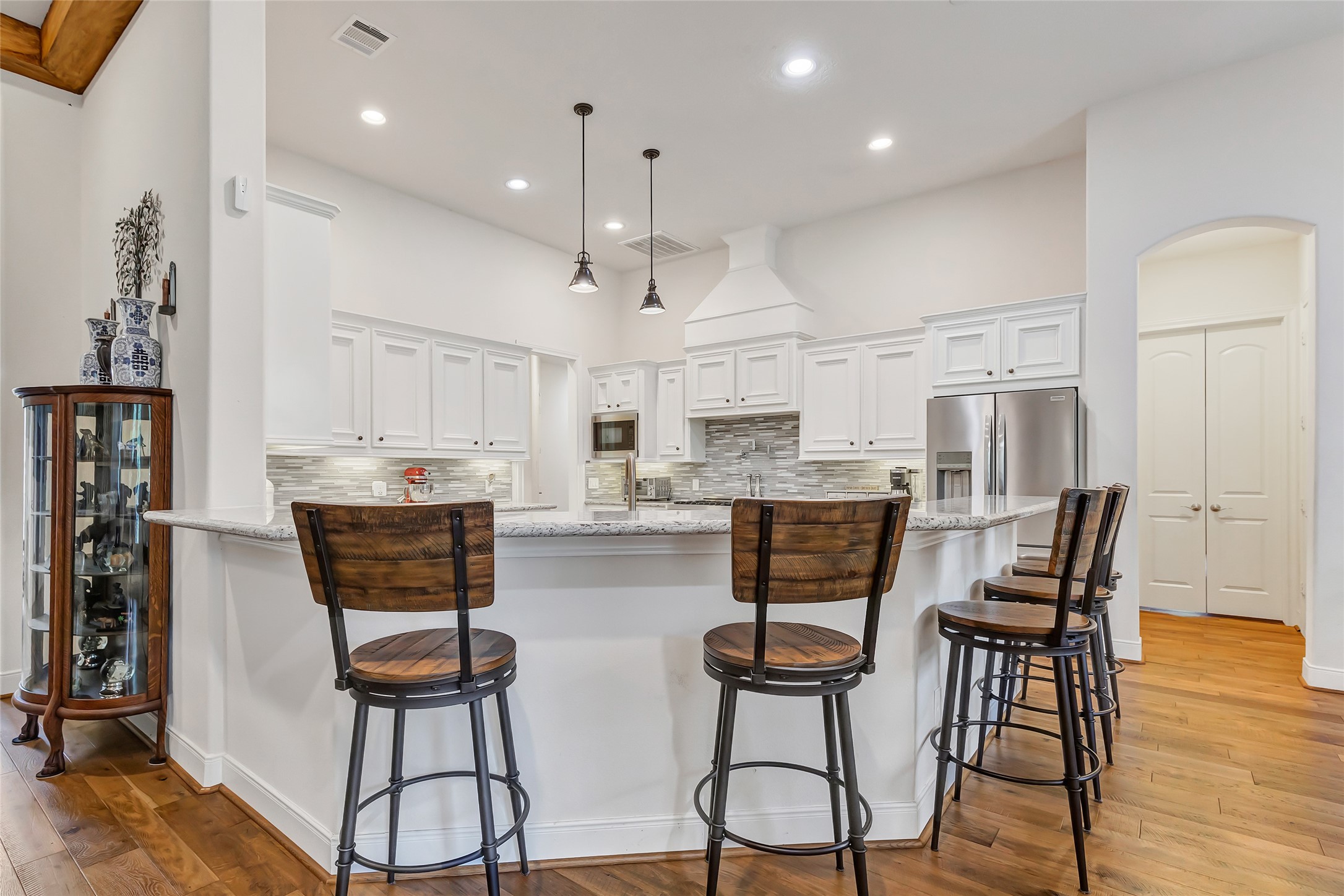 229 Sundog Road Huntsville, TX 77340 - Photo 17 of 50 As you enter the Kitchen you'll see the counter with the bar chairs for casual dining or entertaining while cooking!