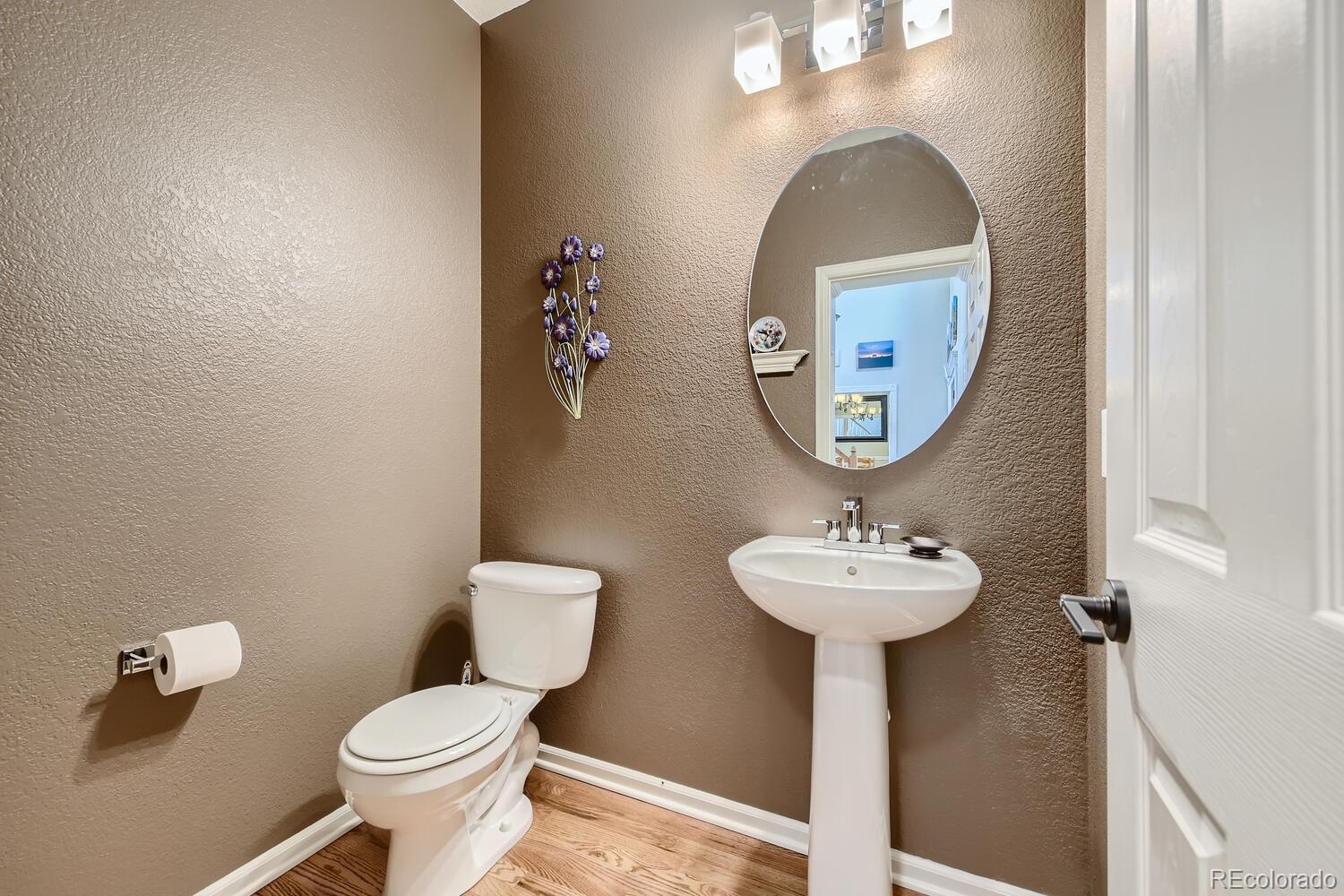 3897 Mallard Lane Highlands Ranch, CO 80126 - Photo 21 of 50 a bathroom with a sink and a mirror