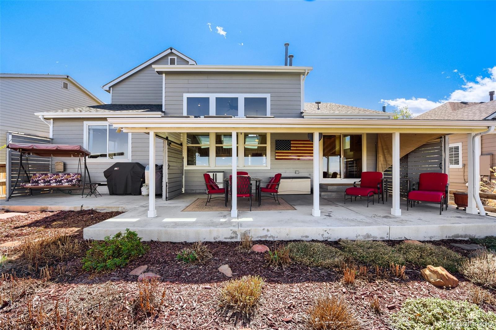 3897 Mallard Lane Highlands Ranch, CO 80126 - Photo 30 of 50 a view of a dinning table and chairs in the patio