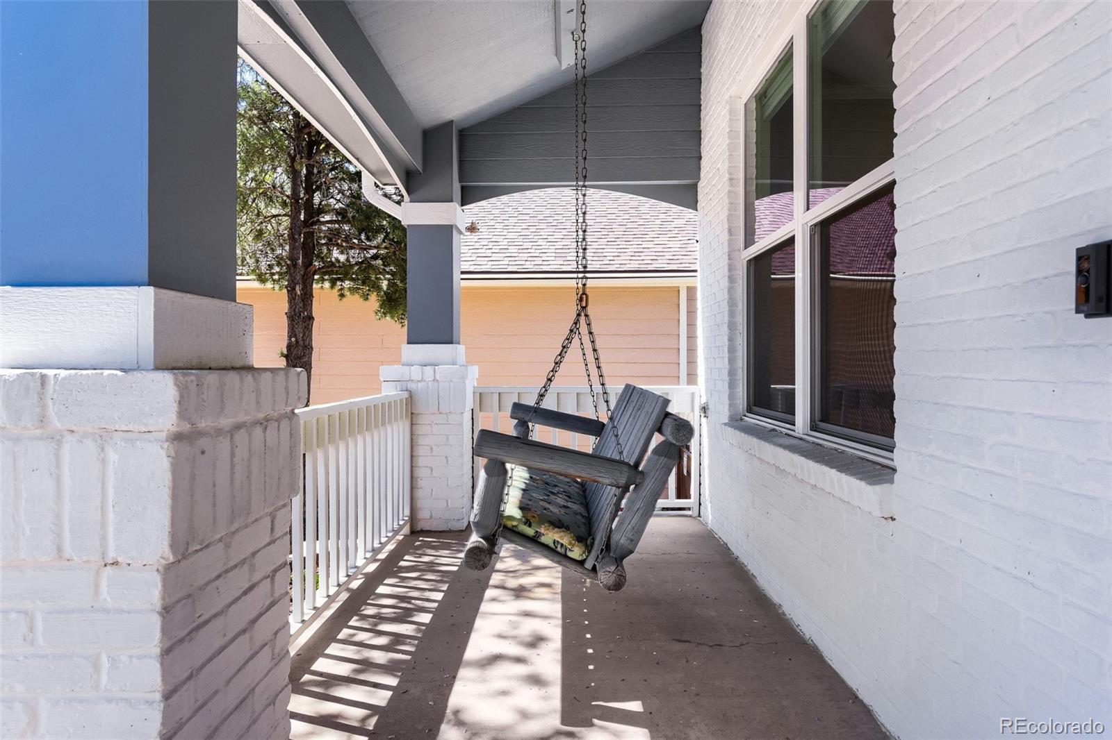 3897 Mallard Lane Highlands Ranch, CO 80126 - Photo 3 of 50 a view of a balcony with wooden floor and furniture