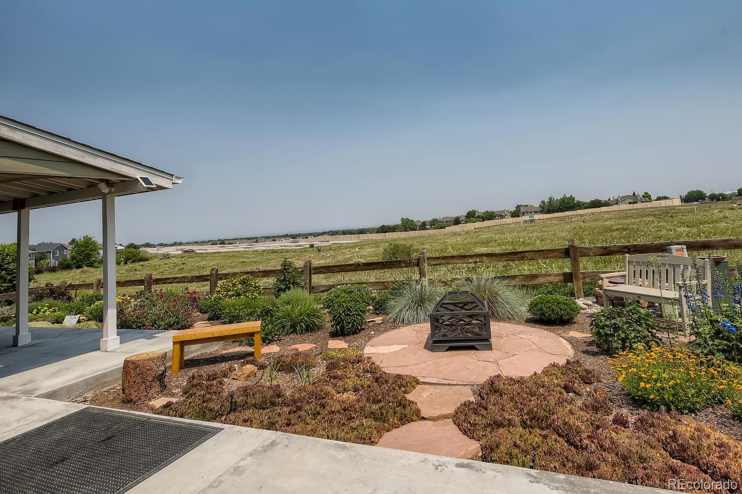 3897 Mallard Lane Highlands Ranch, CO 80126 - Photo 38 of 50 a view of a terrace with wooden floor and seating space