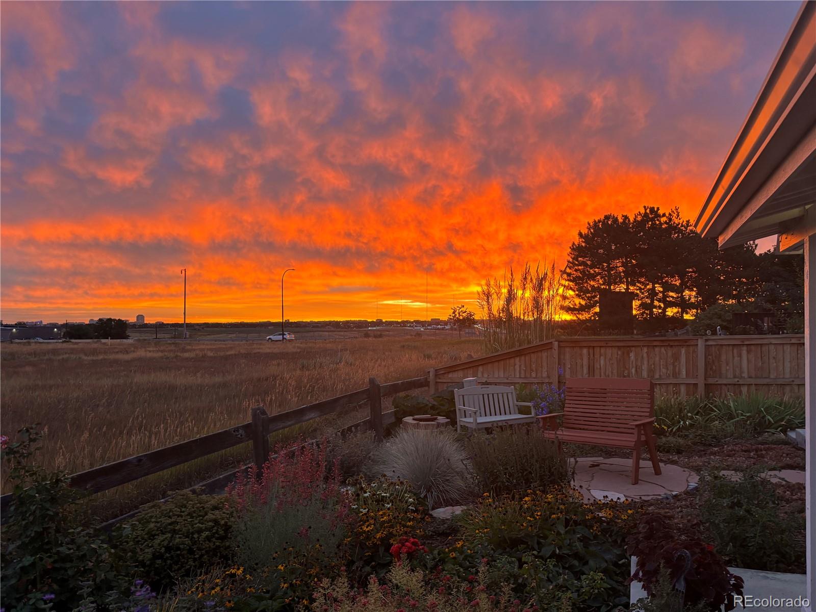 3897 Mallard Lane Highlands Ranch, CO 80126 - Photo 39 of 50 a view of a backyard with sitting area