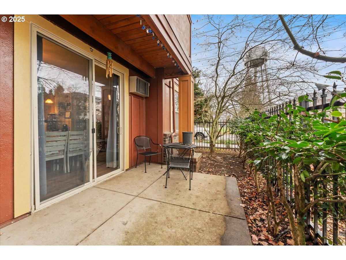 400 Northeast 100th Avenue, Unit 101 Portland, OR 97220 - Photo 15 of 22 a building outdoor space with patio furniture and potted plants