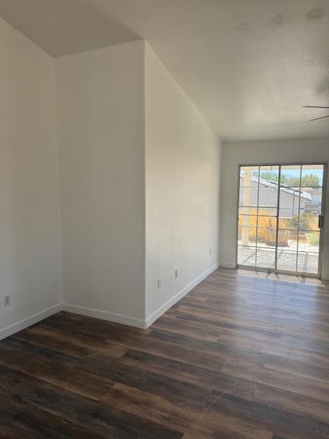 66227 Avenida Cadena Desert Hot Springs, CA 92240 - Photo 3 of 7 a view of an empty room with wooden floor and a window