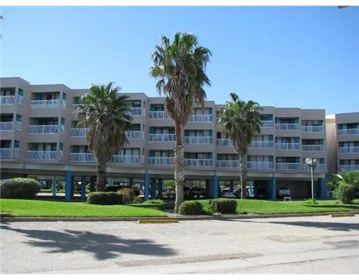 a front view of building with yard
