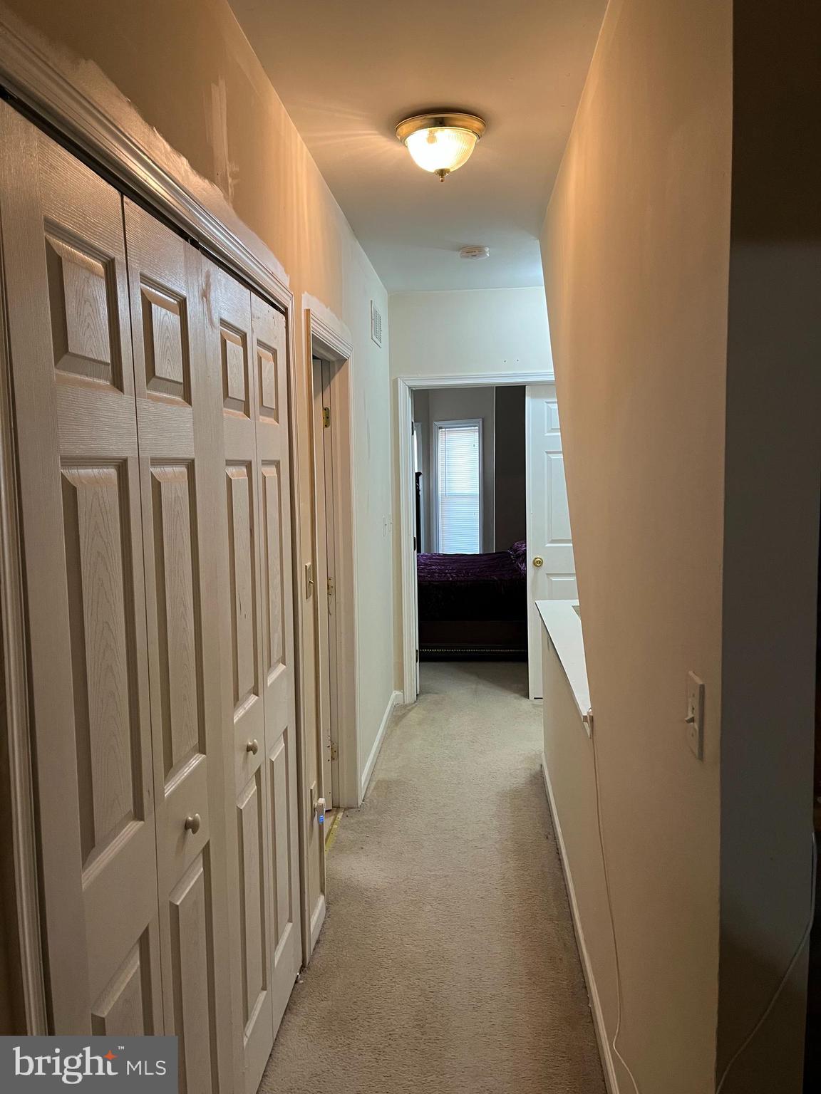 833 North Front Street Reading, PA 19601 - Photo 13 of 24 a view of a hallway with a livingroom