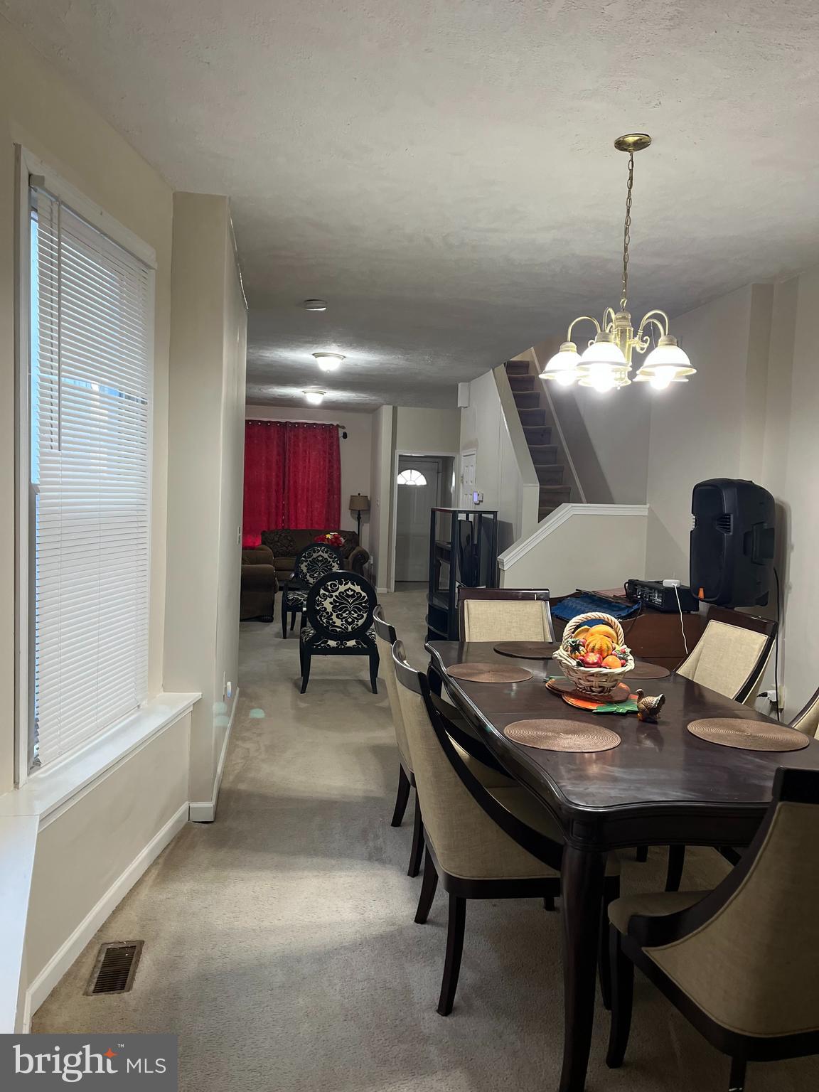833 North Front Street Reading, PA 19601 - Photo 6 of 24 a view of a dining room with furniture and chandelier