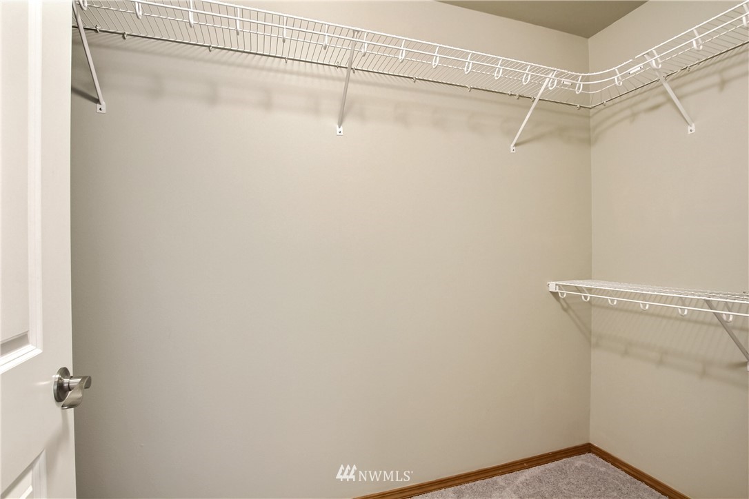 3827 160th Place Southeast Bothell, WA 98012 - Photo 29 of 40 a view of a room with racks on the wall