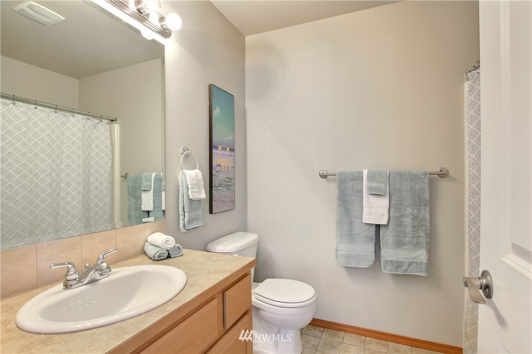 3827 160th Place Southeast Bothell, WA 98012 - Photo 34 of 40 a bathroom with a sink toilet and shower