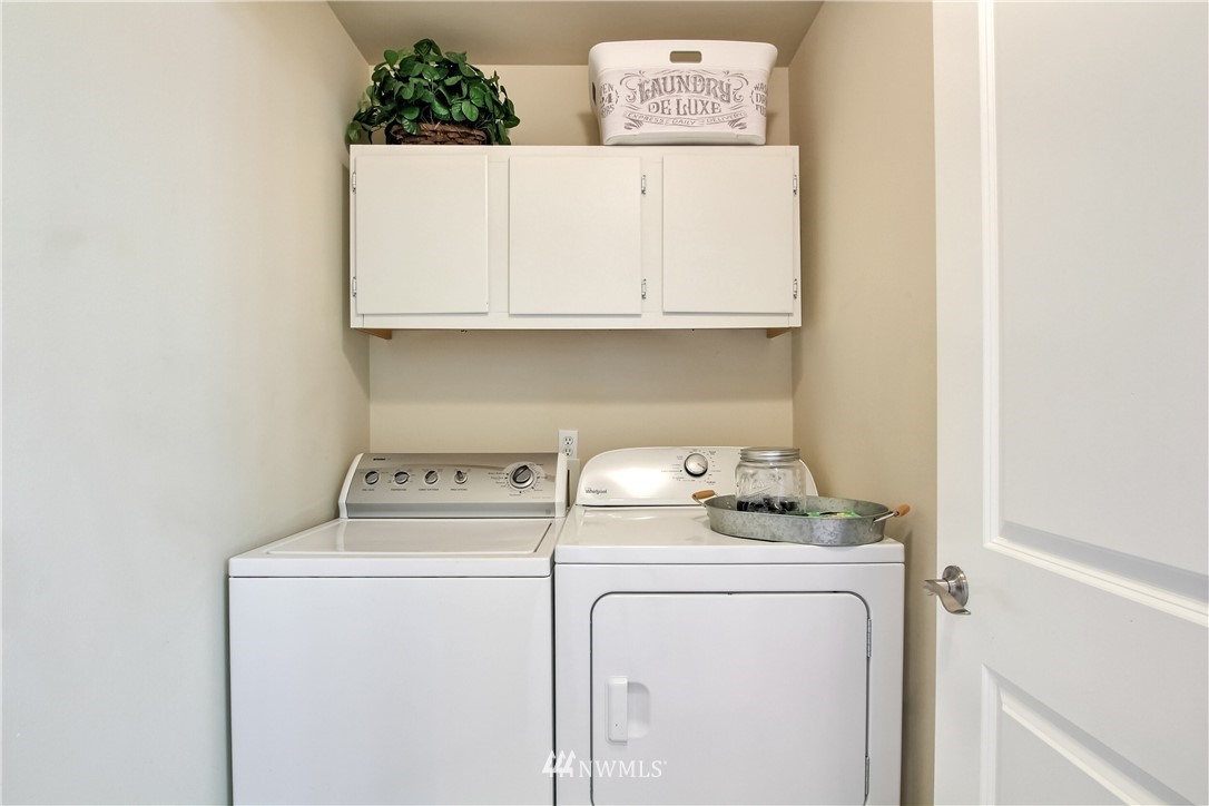 3827 160th Place Southeast Bothell, WA 98012 - Photo 37 of 40 a utility room with dryer and washer