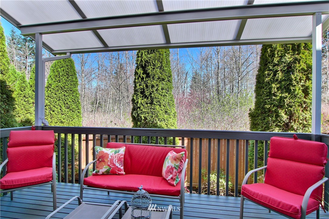 3827 160th Place Southeast Bothell, WA 98012 - Photo 38 of 40 a balcony with wooden floor