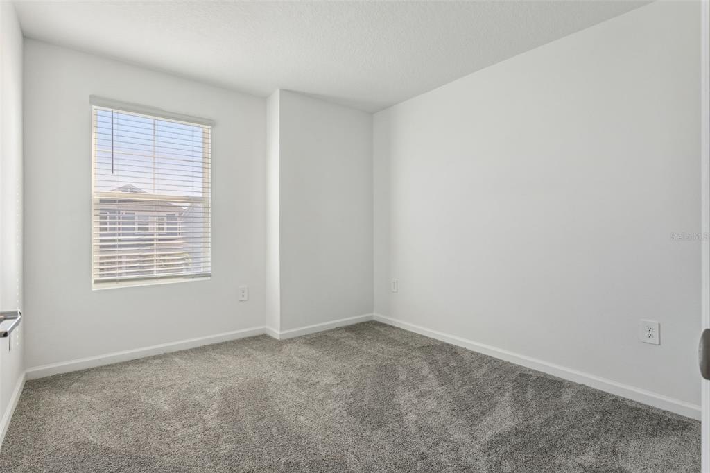 2916 Transformation Way Clermont, FL 34714 - Photo 21 of 91 an empty room with a window