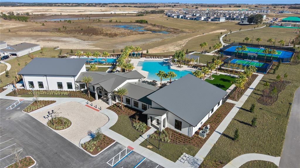 2916 Transformation Way Clermont, FL 34714 - Photo 80 of 91 an aerial view of a house with a yard swimming pool and ocean view