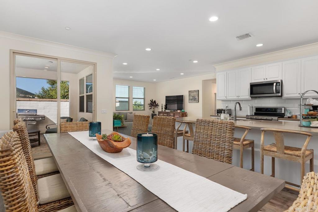 655 Merit Drive San Marcos, CA 92078 - Photo 12 of 35 a kitchen with lots of counter top space and appliances