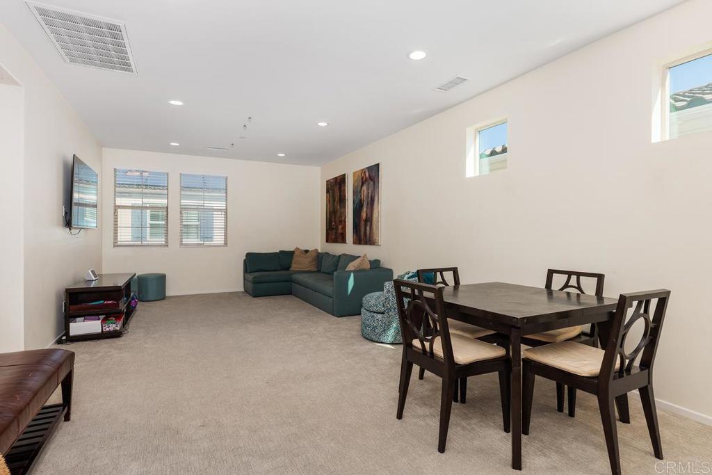 655 Merit Drive San Marcos, CA 92078 - Photo 16 of 35 a view of a livingroom with furniture and a window