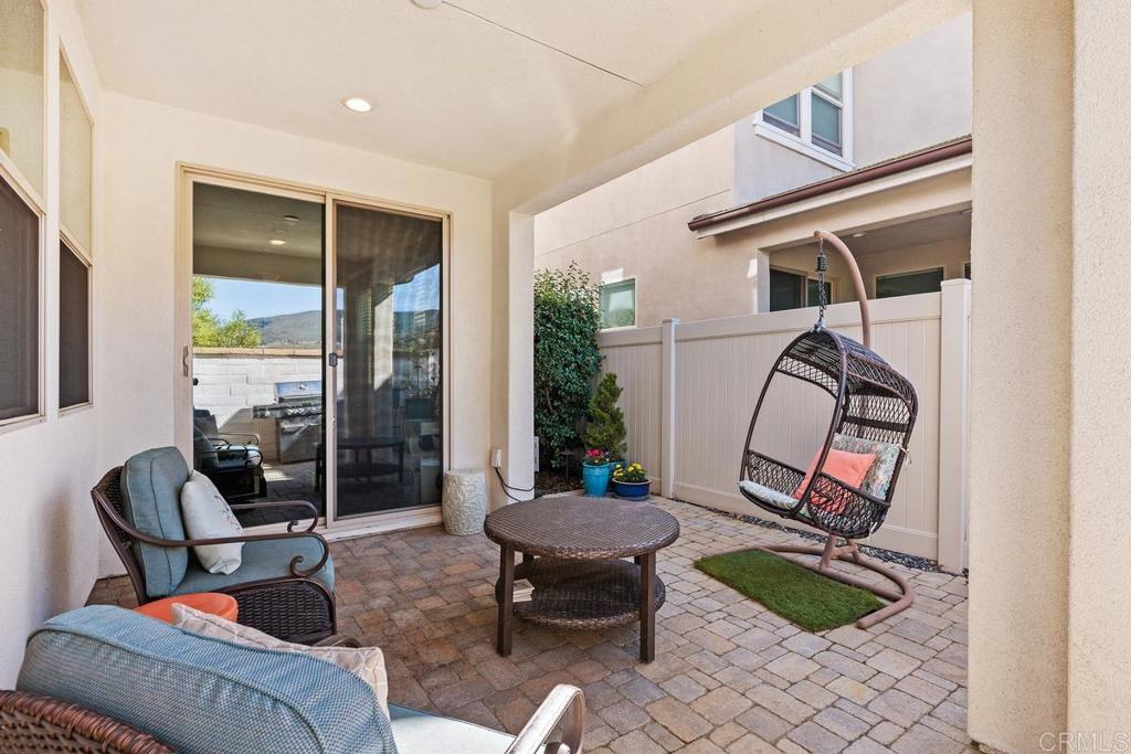 655 Merit Drive San Marcos, CA 92078 - Photo 25 of 35 a living room with furniture and a rug