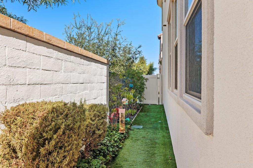 655 Merit Drive San Marcos, CA 92078 - Photo 26 of 35 a view of a backyard with pathway