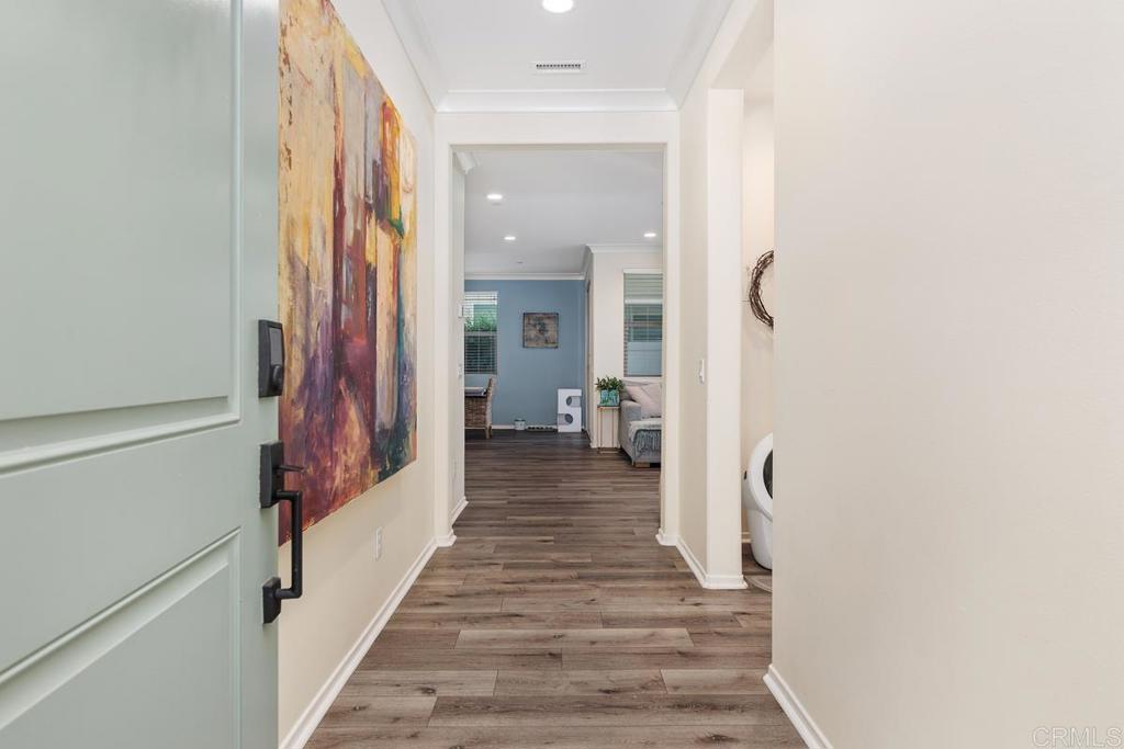 655 Merit Drive San Marcos, CA 92078 - Photo 3 of 35 a view of a hallway with a living room