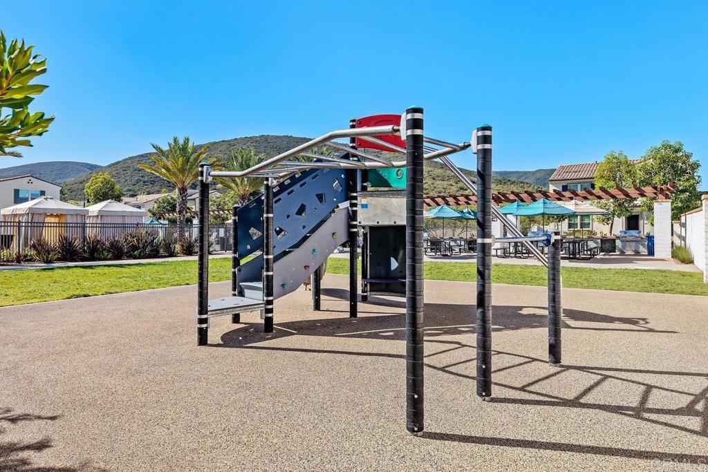 655 Merit Drive San Marcos, CA 92078 - Photo 32 of 35 a sign board with yard