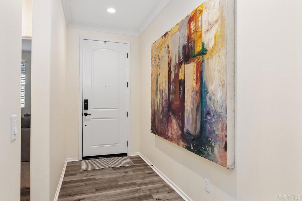 655 Merit Drive San Marcos, CA 92078 - Photo 4 of 35 a view of a entryway with wooden floor