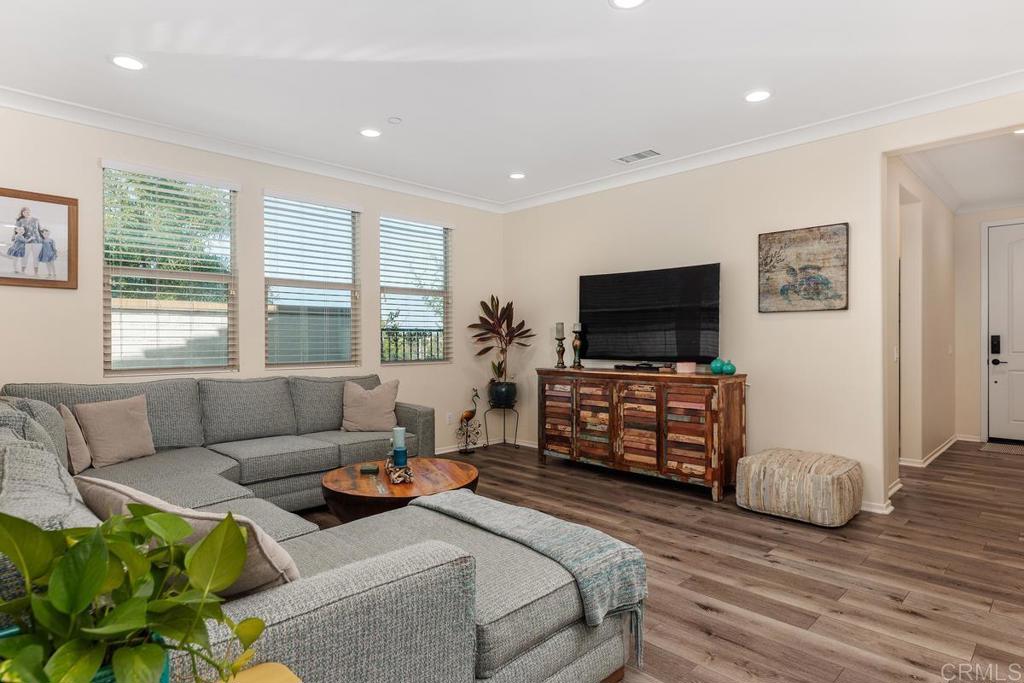 655 Merit Drive San Marcos, CA 92078 - Photo 5 of 35 a living room with furniture and a flat screen tv