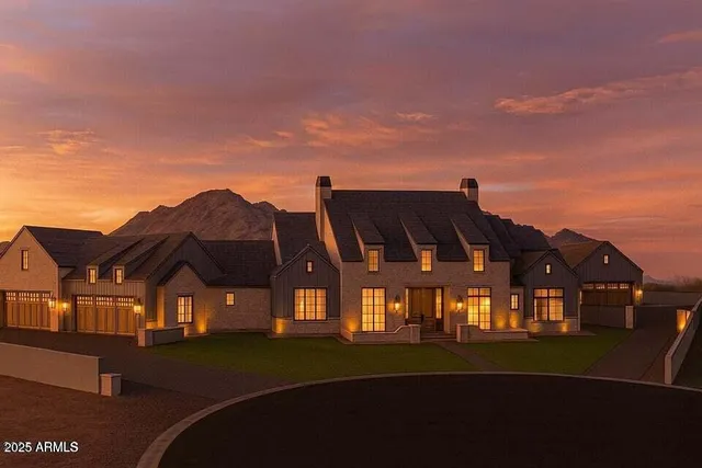 a view of house with yard and furniture