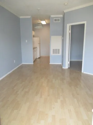 a view of a hallway with an empty space