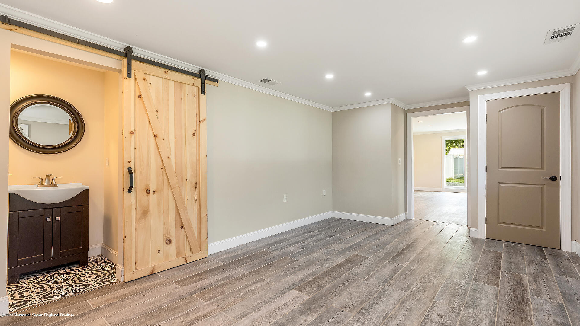 138 Cherry Tree Farm Road Middletown, NJ 07748 - Photo 3 of 47 a view of a hallway with wooden floor