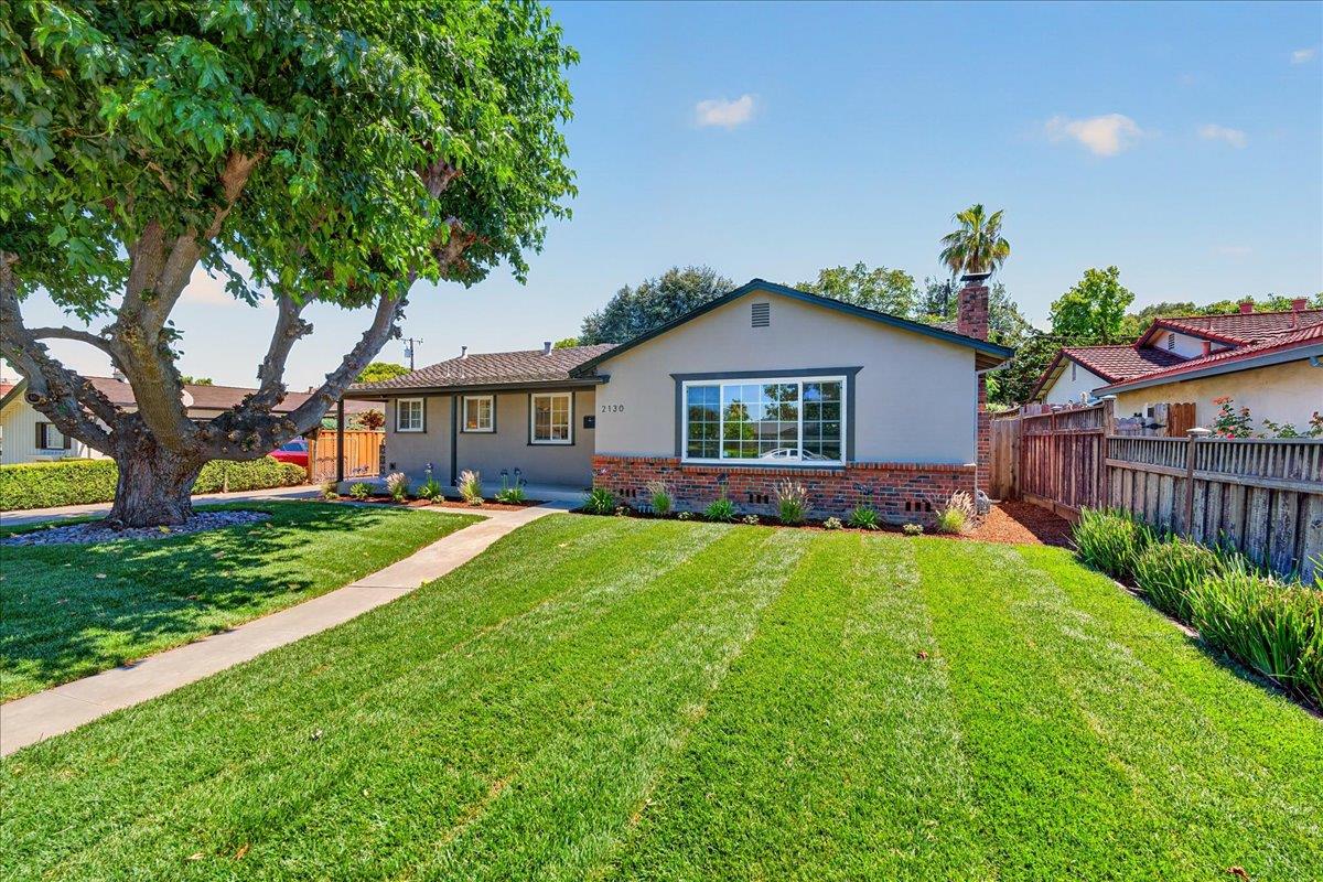 2130 Roenoke Way San Jose, CA 95128 - Photo 21 of 33 a front view of house with yard and green space