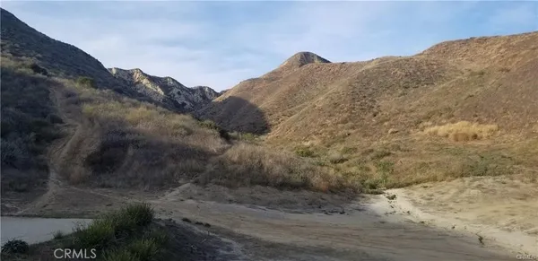 a view of mountain view with mountains in the background