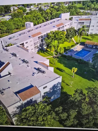 swimming pool view with a outdoor seating