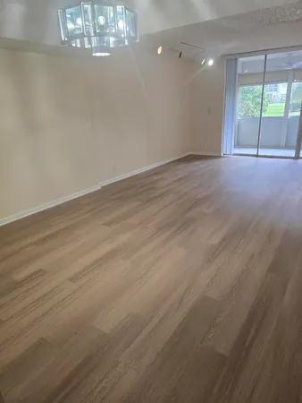 an aerial view of residential houses with swimming pool