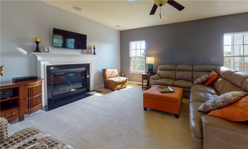 336 Ranchero Drive Coraopolis, PA 15108 - Photo 3 of 23 Family Room featuring built-in surround sound speakers and gas fireplace.