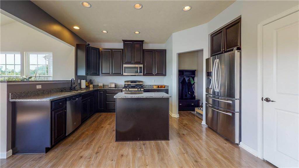 336 Ranchero Drive Coraopolis, PA 15108 - Photo 5 of 23 Beautiful Eat-in Kitchen with recessed lighting, granite countertops and stainless steel appliances.