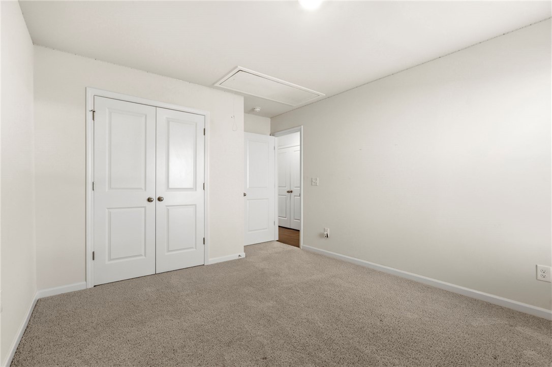 205 Hillendale Way Pelzer, SC 29669 - Photo 16 of 29 This bright room features soft carpeting, a closet, and easy access to an adjacent room.