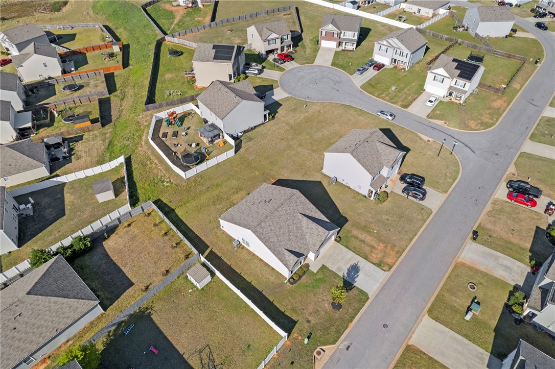 205 Hillendale Way Pelzer, SC 29669 - Photo 29 of 29 This bird's-eye view captures a serene residential neighborhood with well-maintained properties.