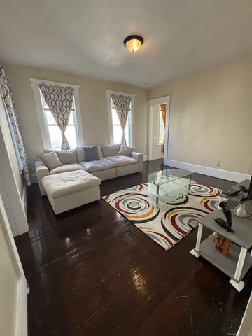 a bedroom with bed and window