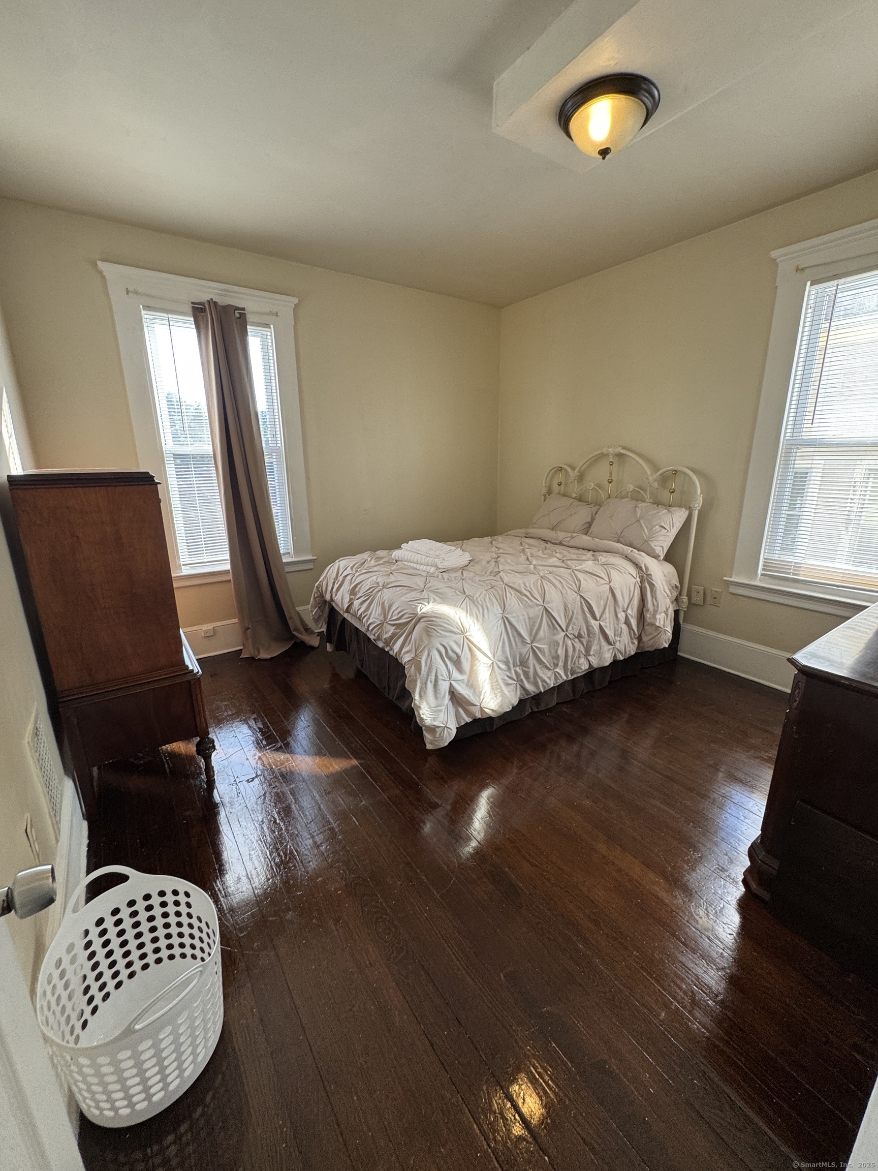 766 George Street, Unit 2 New Haven, CT 06511 - Photo 17 of 20 a bedroom with a bed and wooden floor