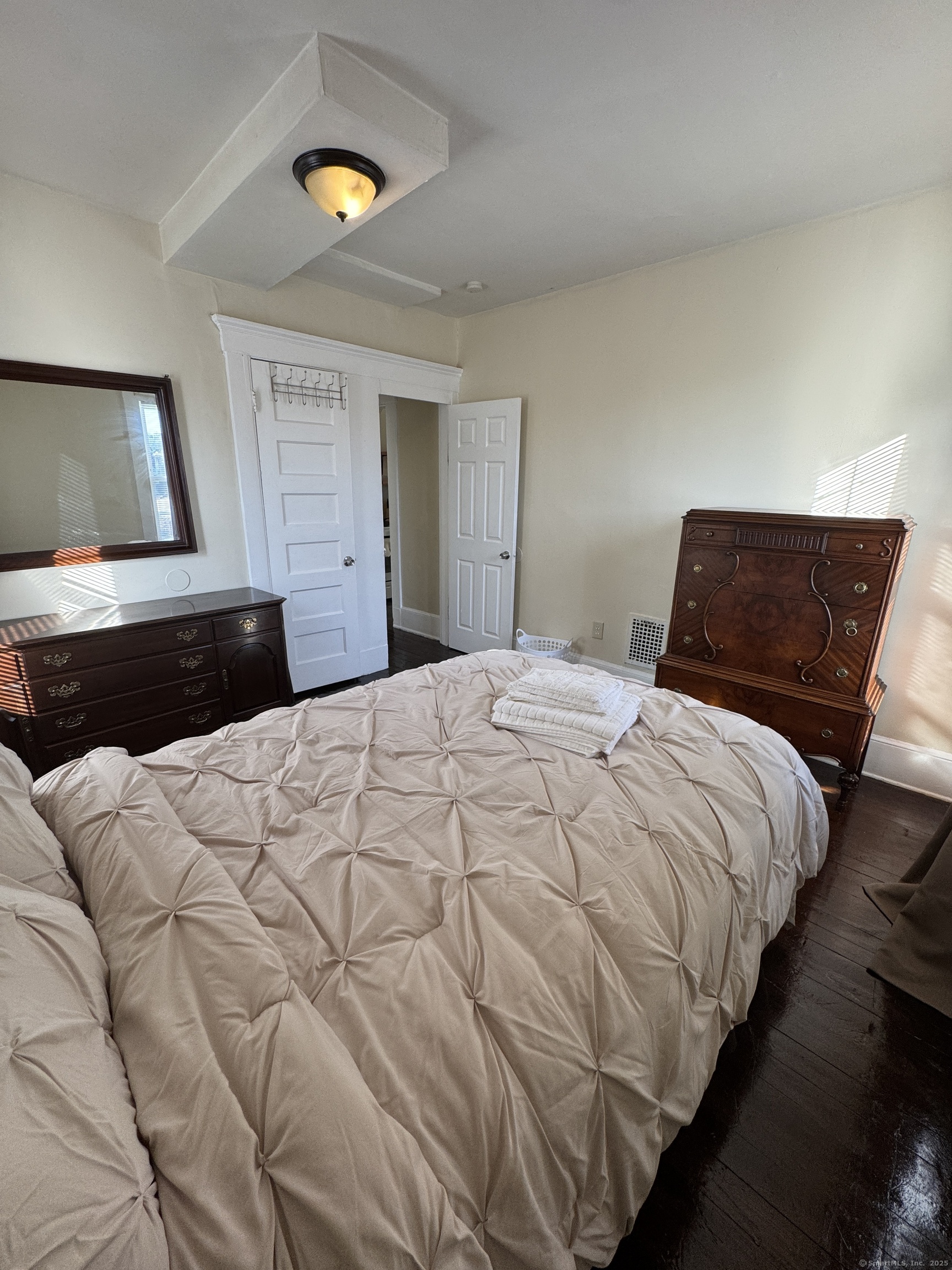 766 George Street, Unit 2 New Haven, CT 06511 - Photo 19 of 20 a bedroom with a bed and window