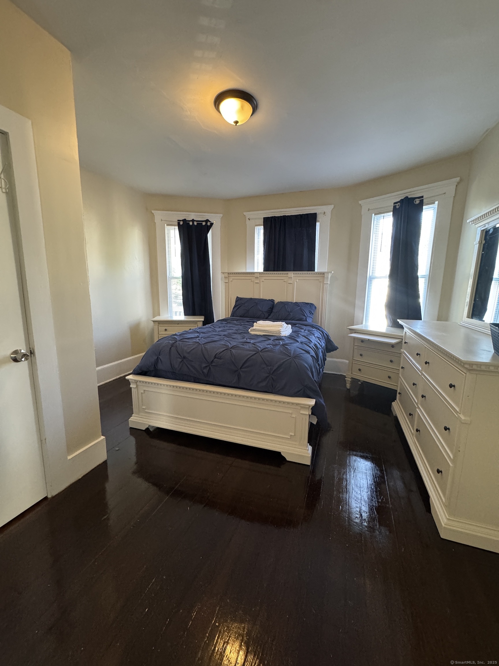 766 George Street, Unit 2 New Haven, CT 06511 - Photo 4 of 20 a bedroom with a bed and a night stand