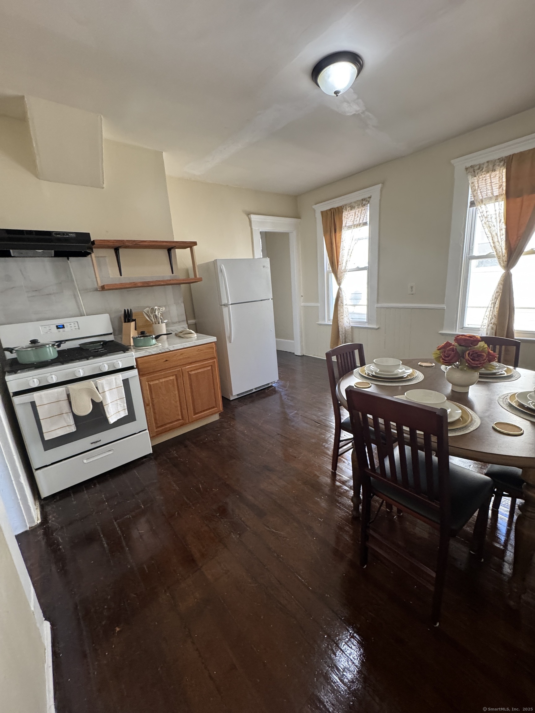 766 George Street, Unit 2 New Haven, CT 06511 - Photo 7 of 20 a view of a dining room with furniture
