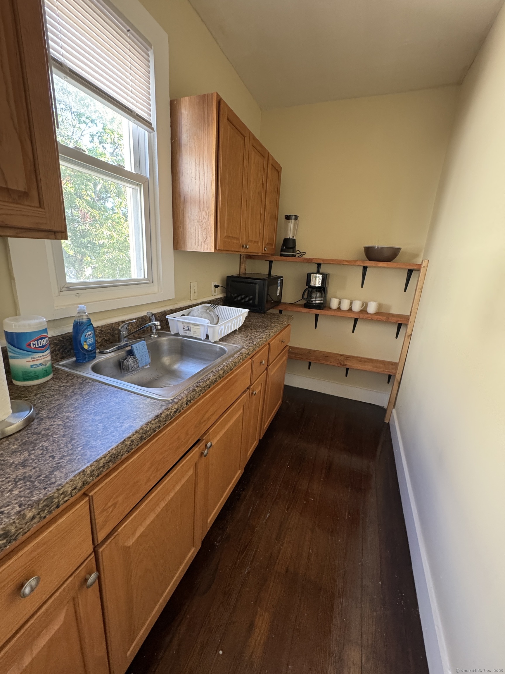 766 George Street, Unit 2 New Haven, CT 06511 - Photo 9 of 20 a kitchen with sink cabinets and window
