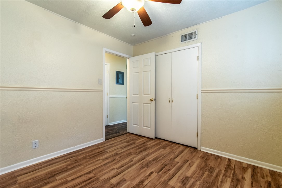 5802 Limerick Drive Corpus Christi, TX 78413 - Photo 26 of 34 a view of an empty room with wooden floor