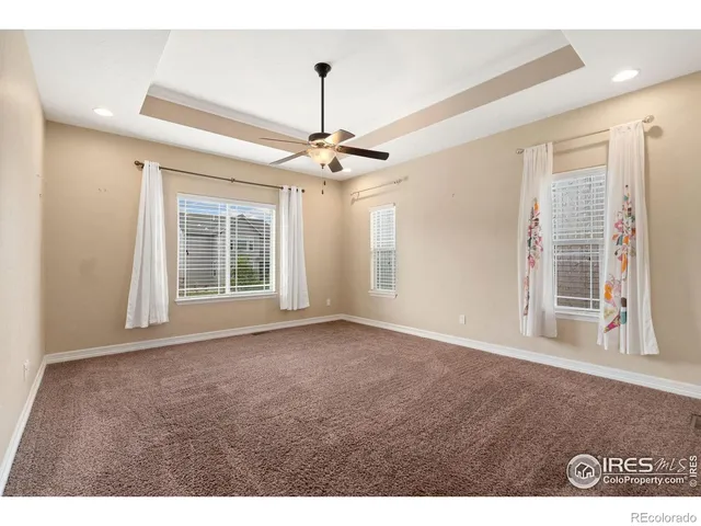 a kitchen with stainless steel appliances granite countertop a sink refrigerator and cabinets