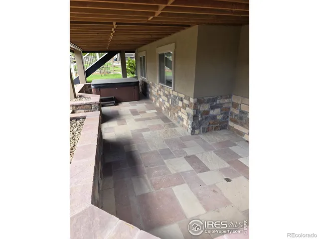 a view of porch with furniture