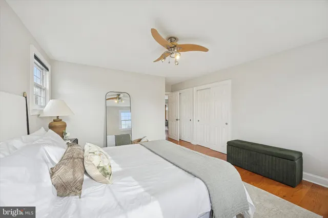 a bedroom with a bed and a closet